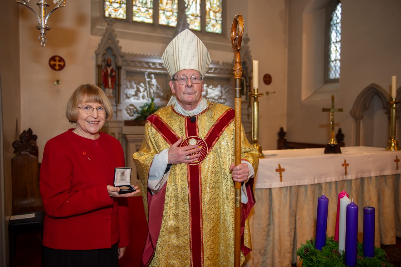 Priest Leading a service